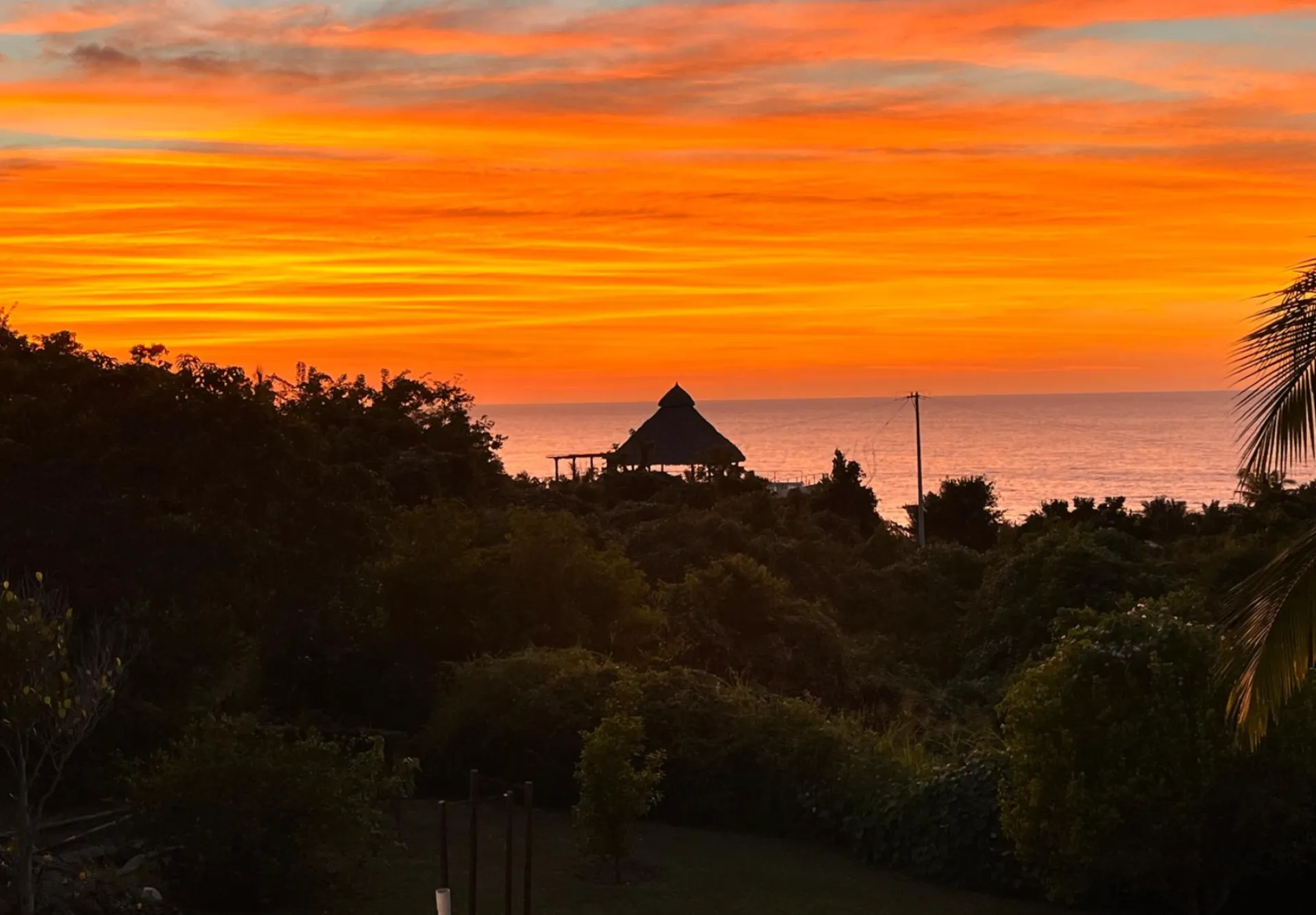 Fiery sunset over the Pacific seen from Casa de Mango