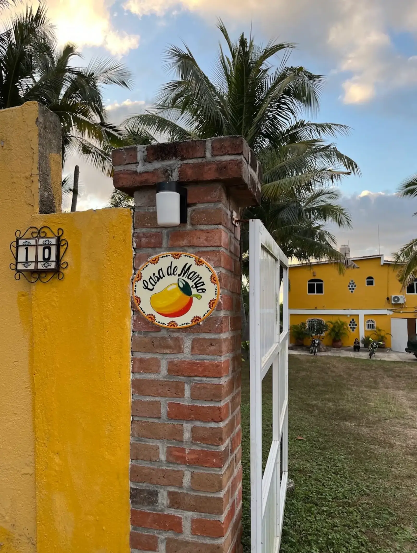 The mango-yellow entrance to Casa de Mango